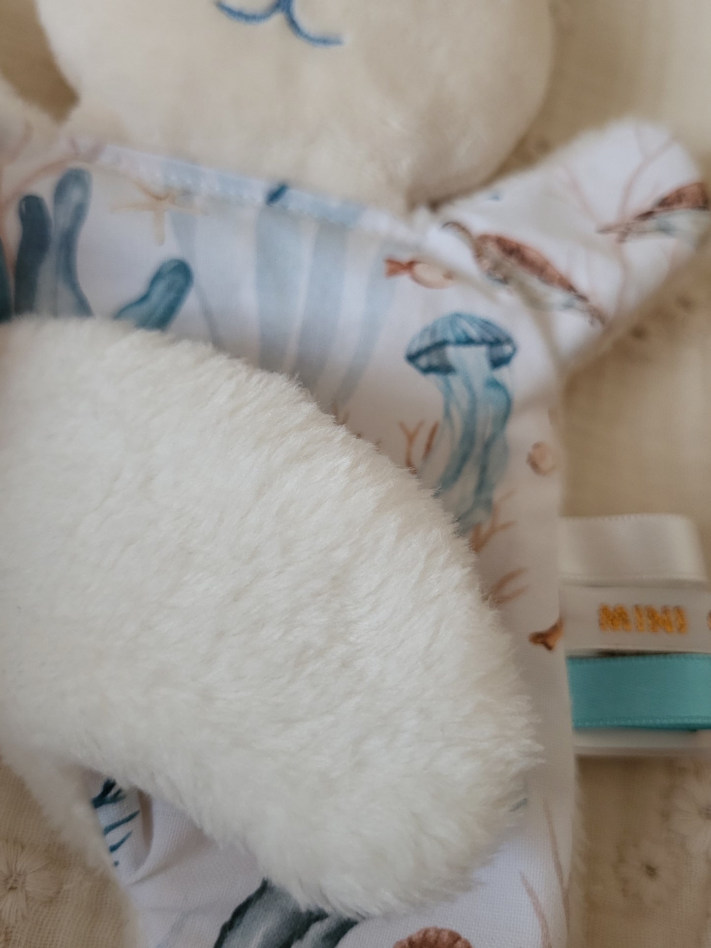 Mini doudou lapin MER